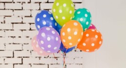 assorted-color polka dot balloons